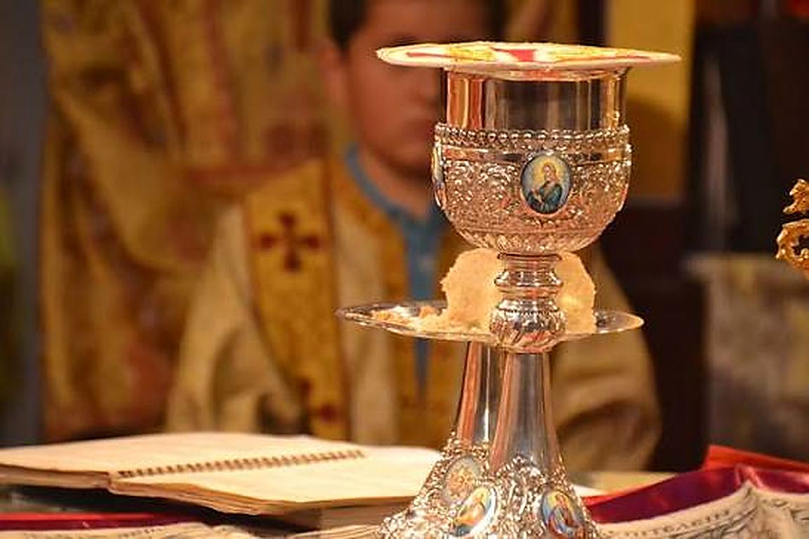 The chalice and the diskos on the holy table